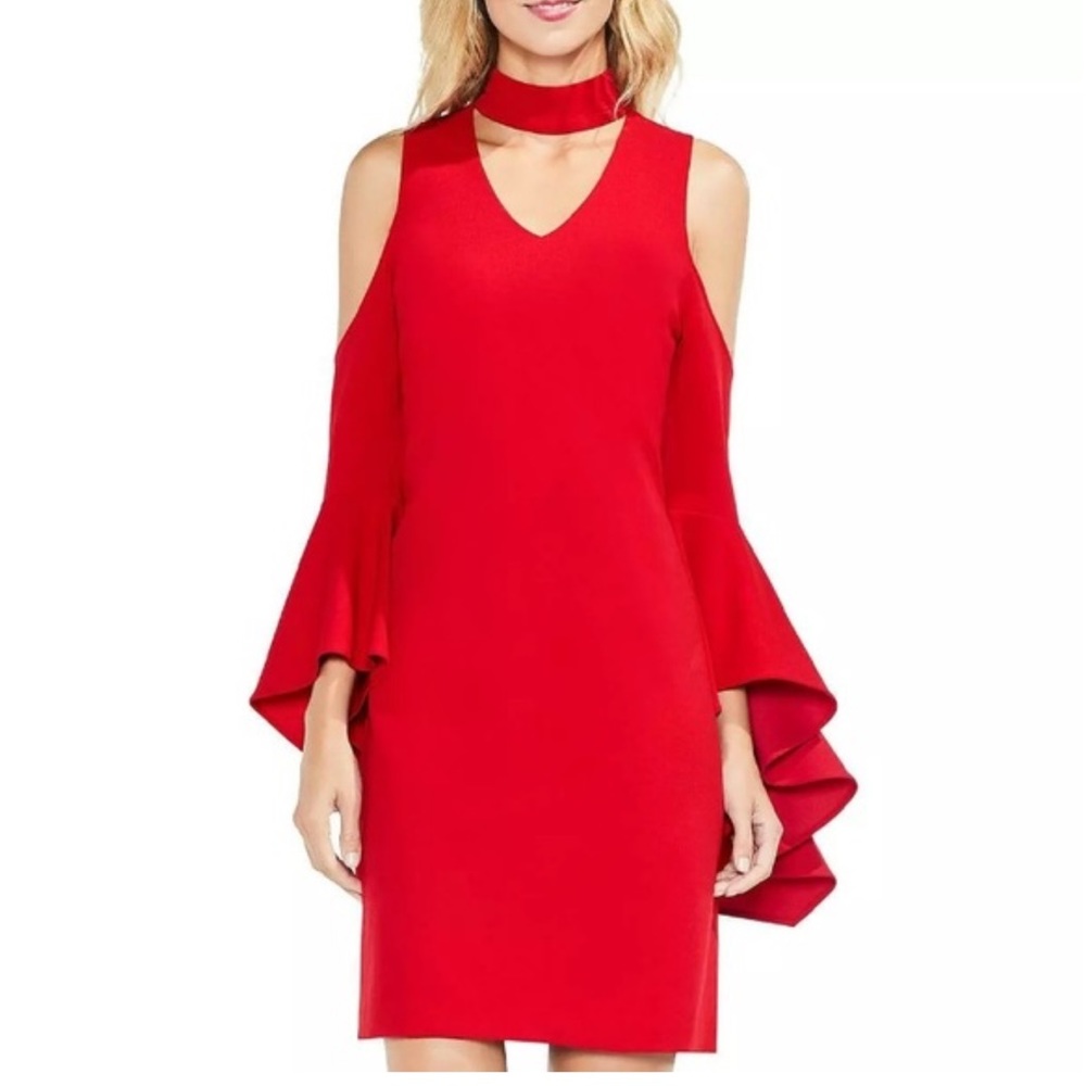 Vince Camuto: dramatic cold shoulder sheath knee length cocktail dress.